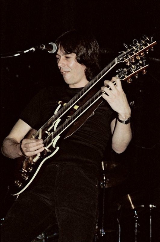 Camel - Andrew Latimer Playing Guitar on Stage, England, 1979 Poster (3/3)