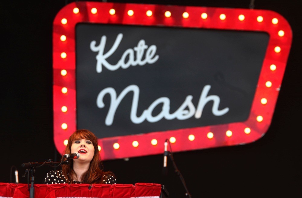 Kate Nash - Singing at the Piano on Stage with Banner Backdrop, England, 2007 Poster