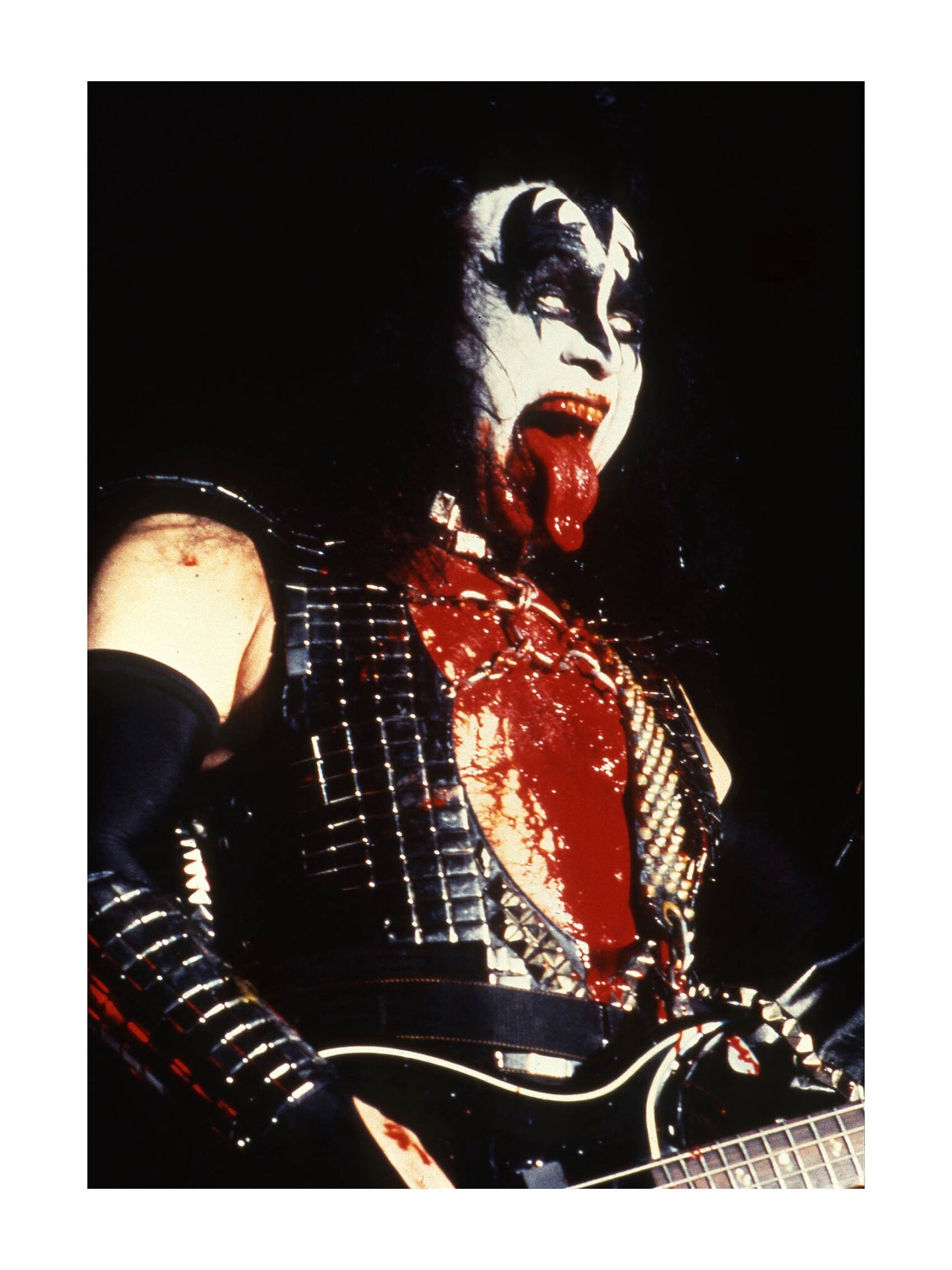 Kiss - Gene Simmons With His Tongue Out on Stage, England, 1996 Print