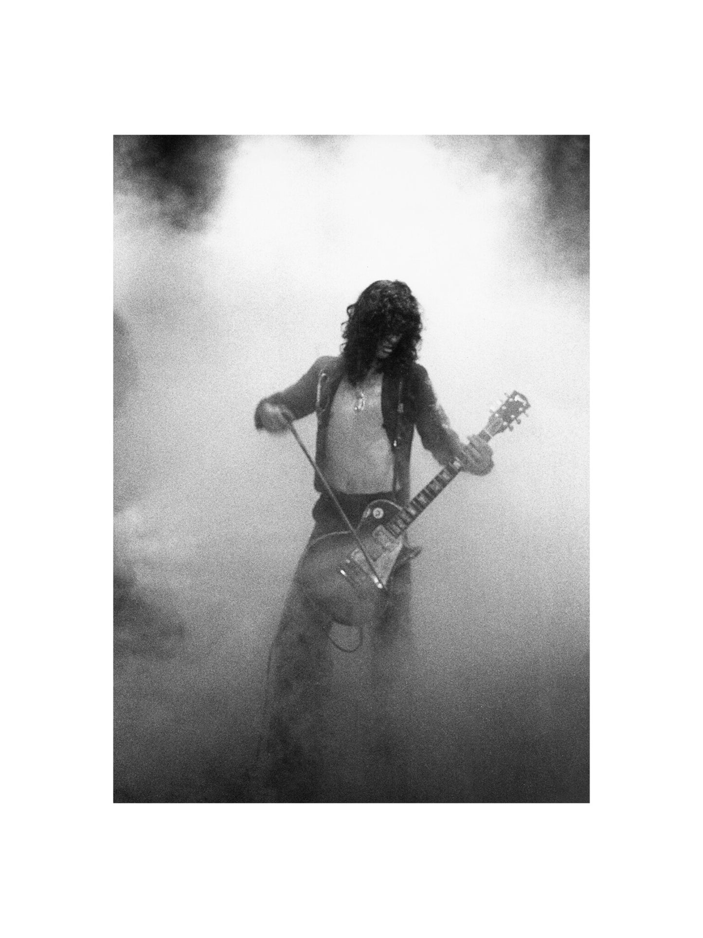 Led Zeppelin - Jimmy Page Playing Guitar with a Bow, England, 1975 Print
