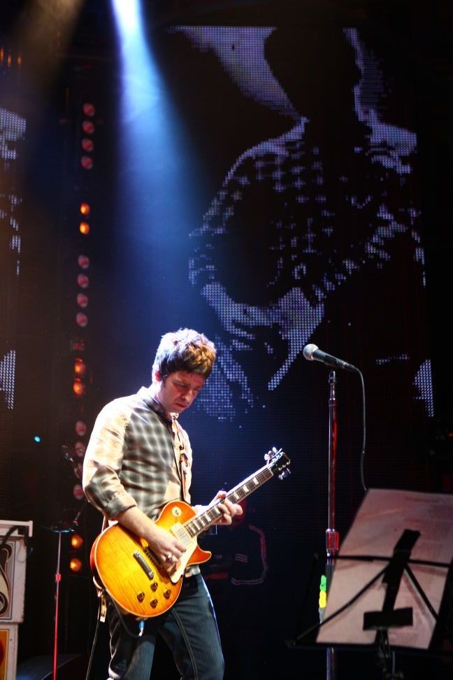 Oasis - Noel Gallagher on Stage with Projection Backdrop, England, 2008 Poster (3/4)
