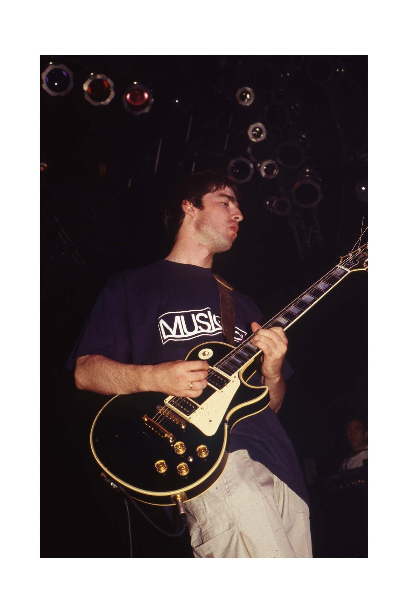 Oasis - Noel Gallagher Playing Guitar Live, England, 1995 Print
