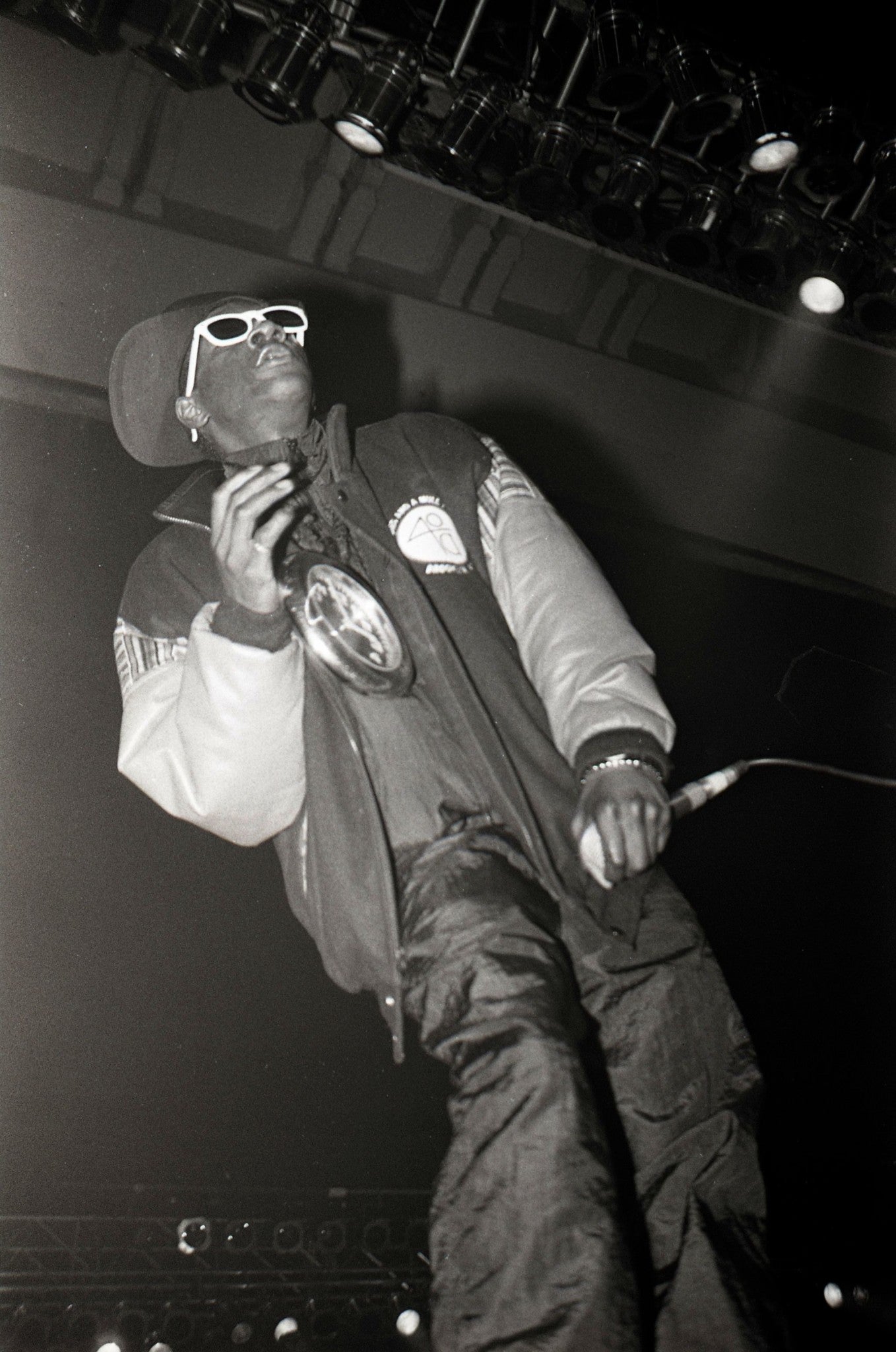 Public Enemy - Holding the Microphone on Stage, England, 1990 Poster