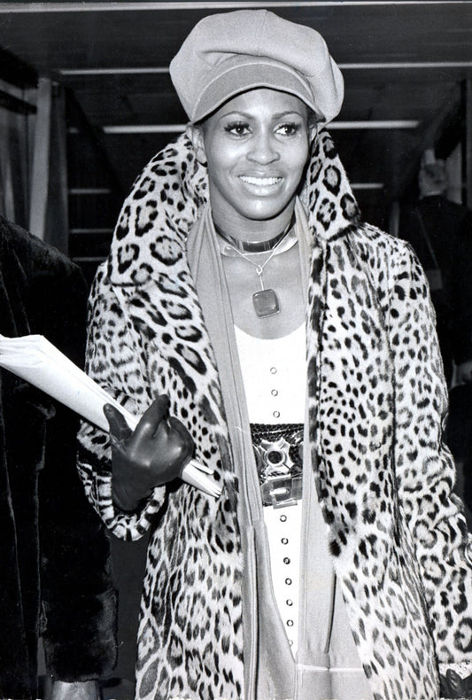 Tina Turner - Wearing a Leopard Skin Coat in Paris, 1970 Print